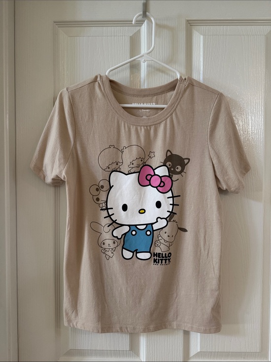 Hello Kitty Tops - Hello Kitty Beige Graphic T-shirt Tee with Pink Bow and Blue Outfit